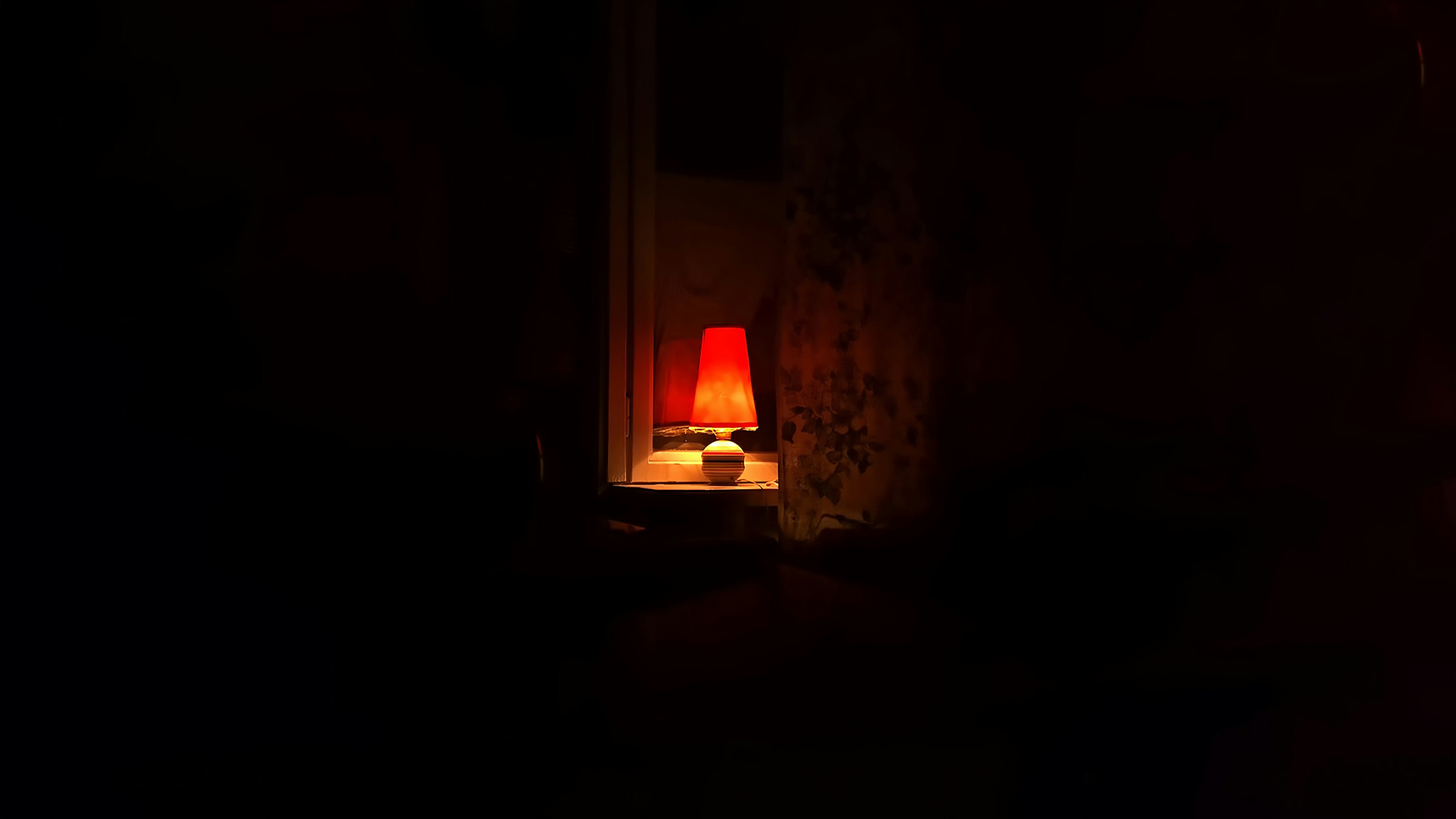 white and brown table lamp on top of surface